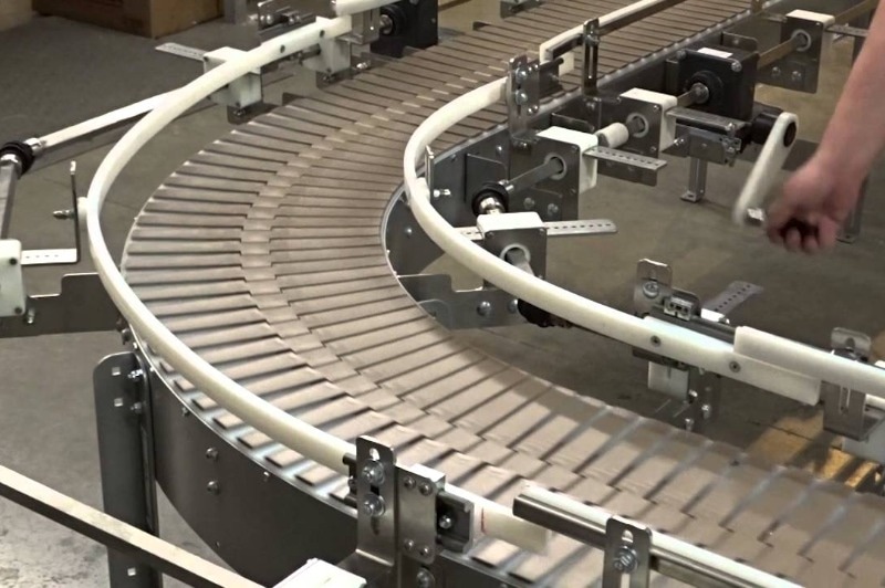 Flexible UHMWPE plastic strip slightly bent to show durability and memory