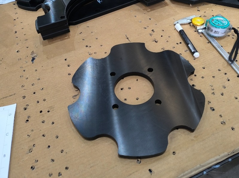 UHMWPE component showing fibrous and smeared surface finish due to machining